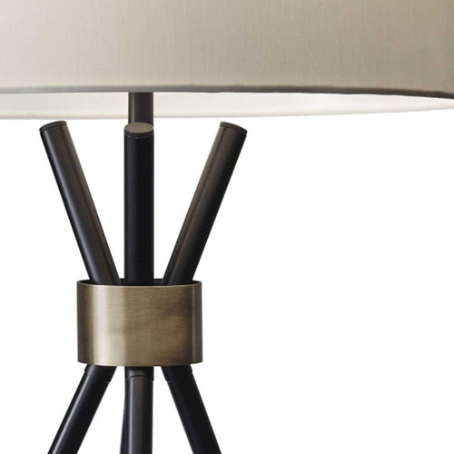 Black Metal Tripod Leg with Antique Brass Accent Table Lamp